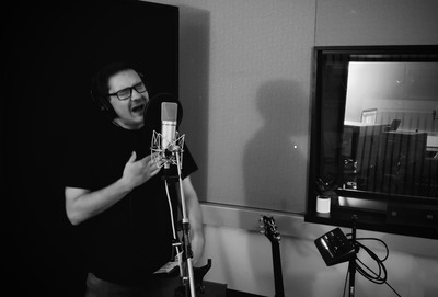 Ryan Ore, recording vocals to 'Drown', in isolation.